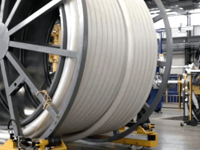 Continuous fiber reinforced thermoplastic tape for flexible pipes